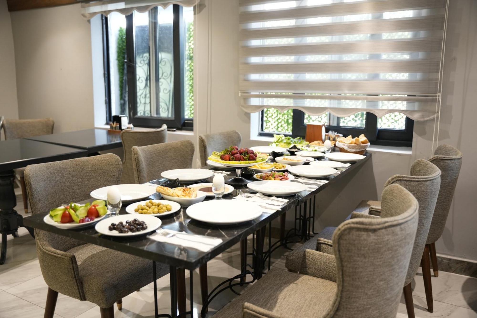 Eniza Hotel 梅尔辛 外观 照片