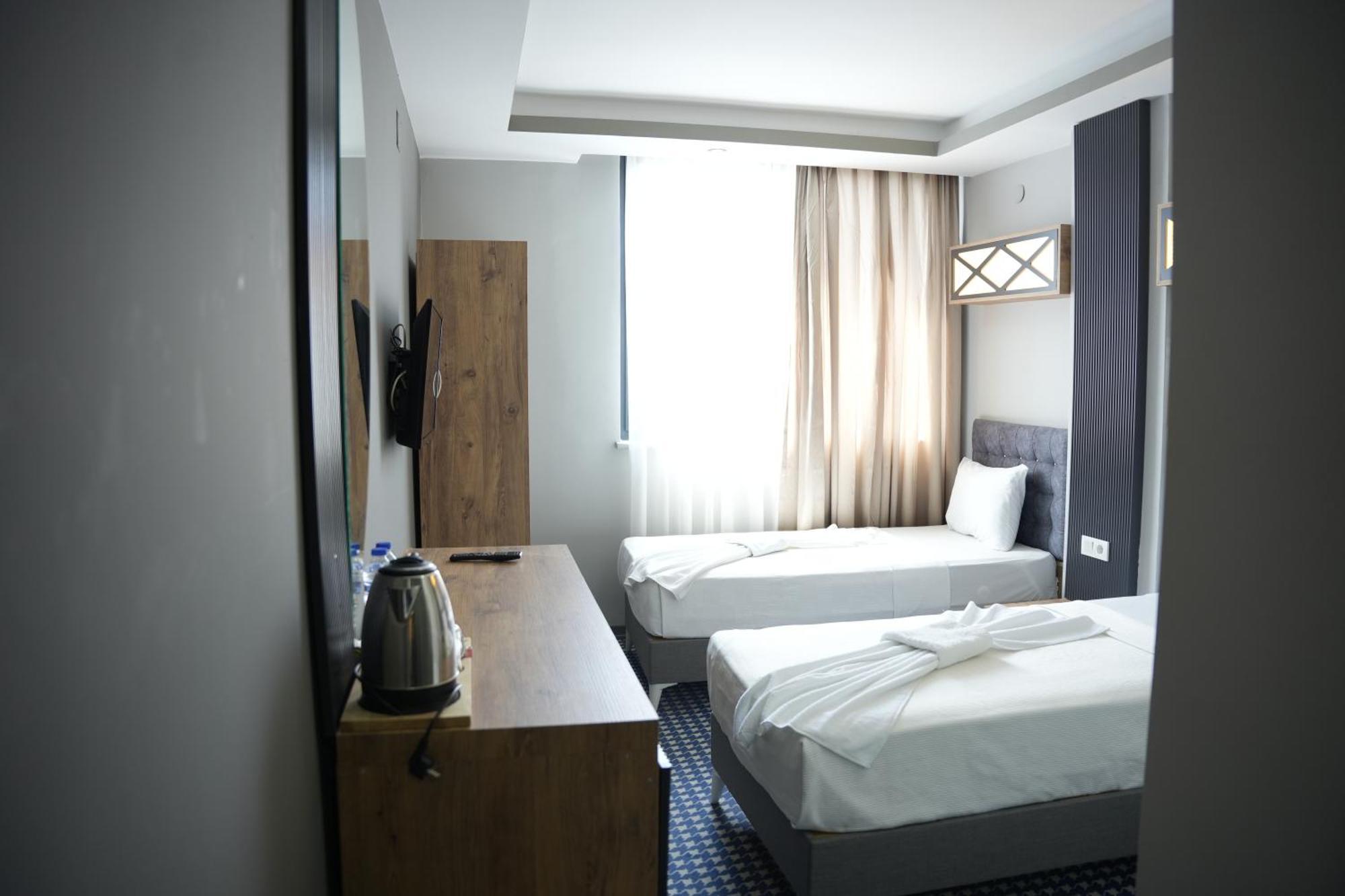 Eniza Hotel 梅尔辛 外观 照片