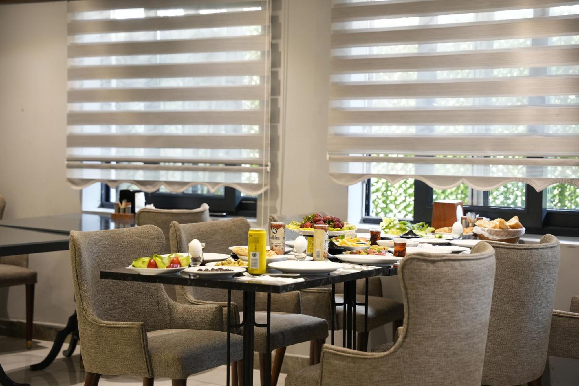 Eniza Hotel 梅尔辛 外观 照片