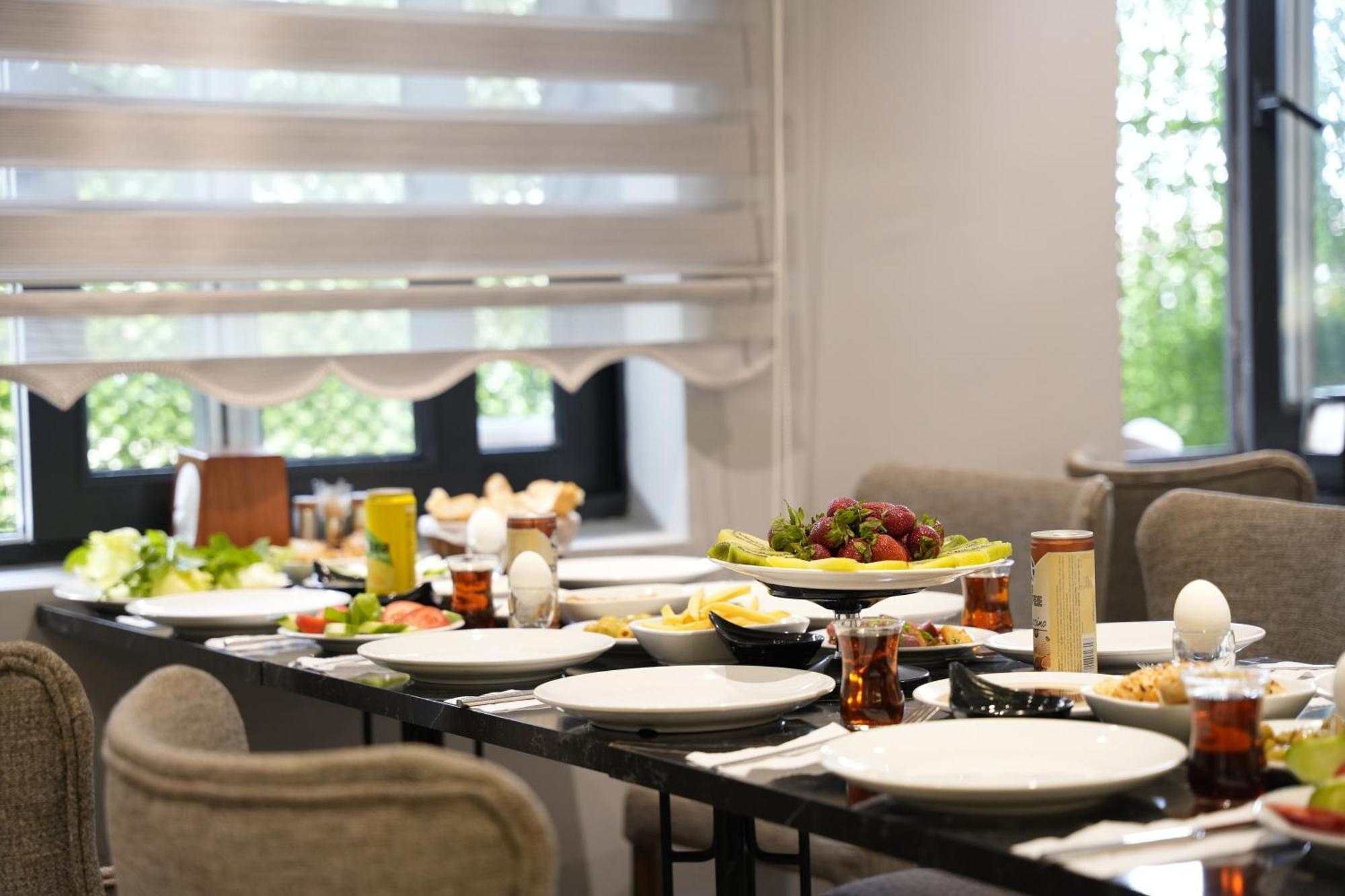 Eniza Hotel 梅尔辛 外观 照片